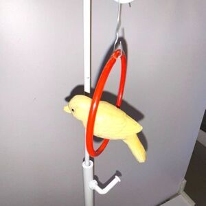 Hard to find celluloid bird Christmas ornament on ring; must see